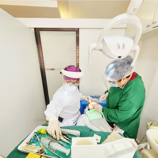 Dr. KC and her assistant are providing braces/retainer services at a dental clinic located in Makati City.