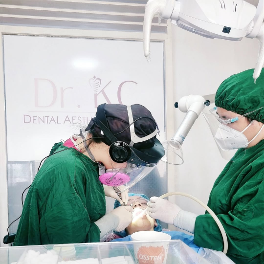 Close-up view of a dentist carefully performing a tooth extraction, using modern techniques to minimize pain.