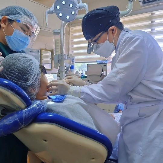Dr. KC and her assistant are applying fluoride treatment to a patient at a dental clinic located in Makati City.
