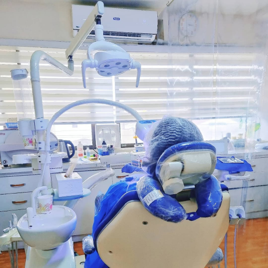 The patient is waiting for her laser teeth whitening procedure.